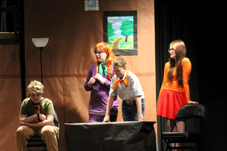 From left, the Mystery Machine - Shaggy (Slade Steffensen), Daphne (Kira Bayliss), Fred (Kade Spencer) and Velma (Karley Halliday) putting their heads together to solve Madam Doyle’s demise. 