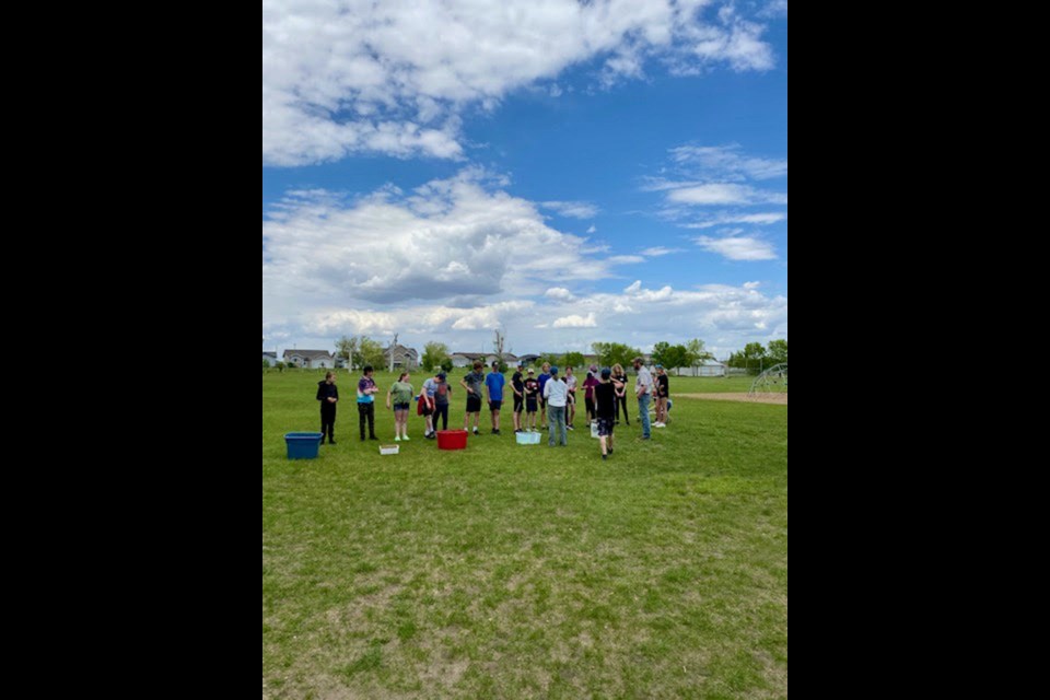 Pleasantdale School students recently planted 64 trees at the border of the schoolyard and the city property. 