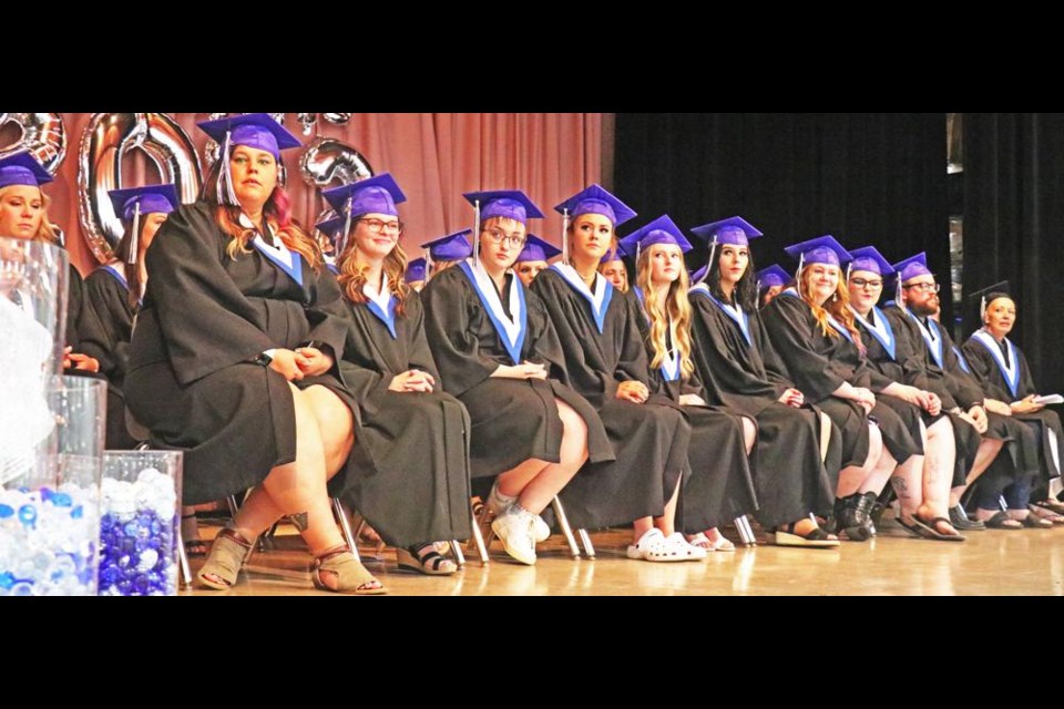 The graduates for the Hairstylist program, Continuing Care Aide program, Practical Nursing and Adult 12 education gathered onstage at McKenna Hall for the grad ceremonies on Friday afternoon