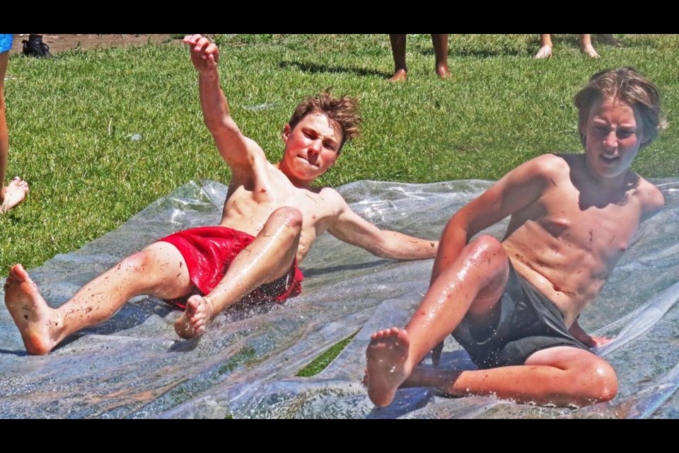 St. Michael students were able to slip and slide and cool off with water on a hot Tuesday afternoon.