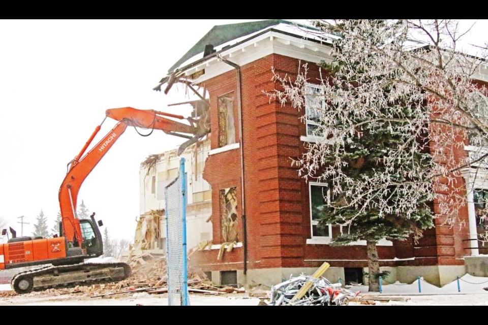 A year and a half after Souris School closed its doors, and the students moved to Legacy Park, demolition crews began taking down the 112-year-old building on Monday.