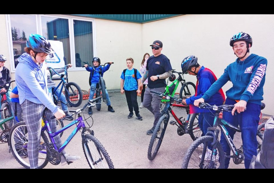 Students in St. Michael School’s Bike Club were ready for some riding on May 3, their first meeting since forming up. From left to right are Kaden, Maria, Konner Dominic, Gracie, guest Dave Hodgkin, Haroun and Ivan.