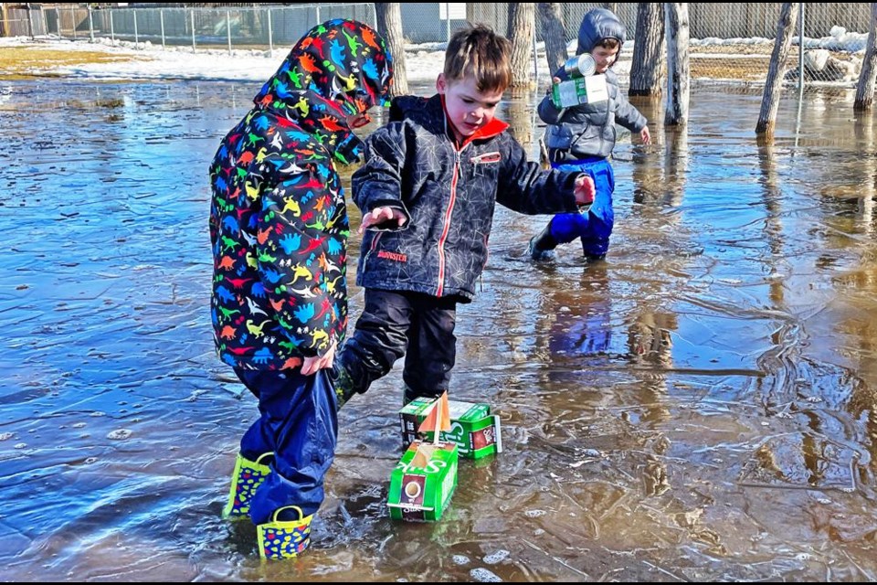 Pre-Kindergarten students Jaxson, Bentley and Thatcher had some springtime fun, as they spent time creating these little boats before taking them outside to see if they would float. This puddle was on the grounds of St. Michael School on April 5.