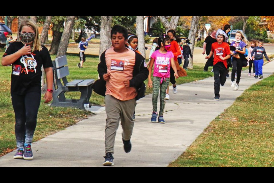 St. Michael School ran, skipped and walked as they took part in the Terry Fox School Run on Wednesday.