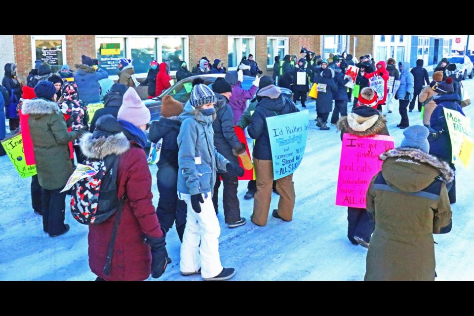 A large number of Weyburn and area teachers gathered to picket the MLA's office in January, in support of the one-day teachers' strike across the province.