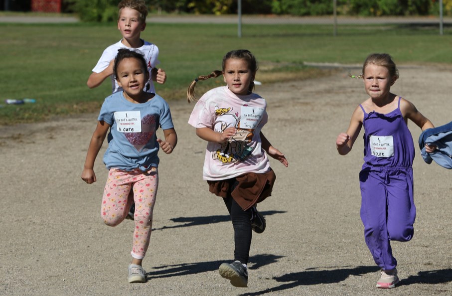 Runners from Canora Junior Elementary School hit the CCS track with all kinds of energy for the Terry Fox Run on Sept. 27.  From left, were: Drew Kitchen, Mia Bryant, Silver Brass and Lilyanna Tomcala.
