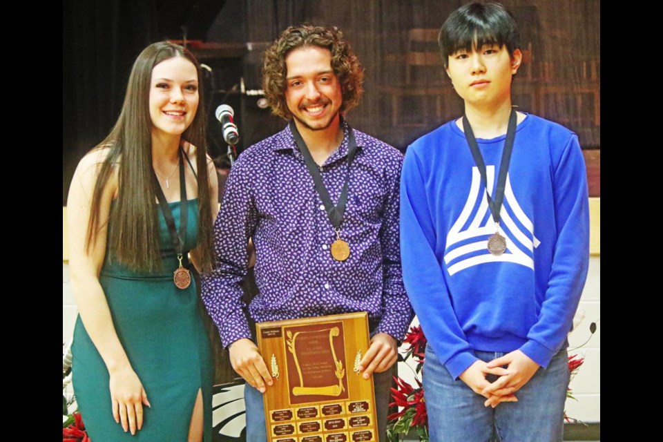 Three of the winners of major awards gathered on Monday, including Emersyn Jordens, TC Douglas medal for girls; Cooper Walbaum, winner of the Tom Zandee Humanitarian Award; and Jun Lee, TC Douglas medal winner for boys