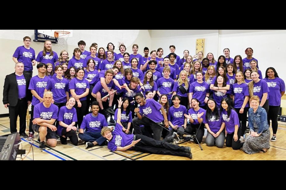 The Grades 10-12 music students from the Weyburn Comprehensive School, along with band director Brayden Jensen and choir director Holly Butz, gathered following a performance at the Forrest Green School in Stoney Plain, Alta.