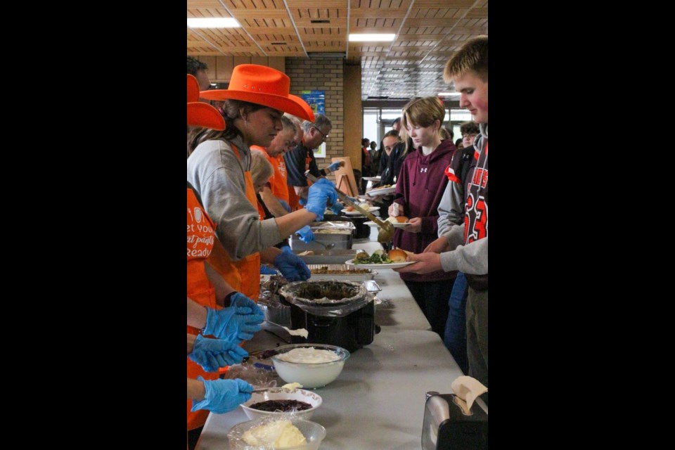 Students, teachers and staff were served thanksgiving feast by local volunteers.