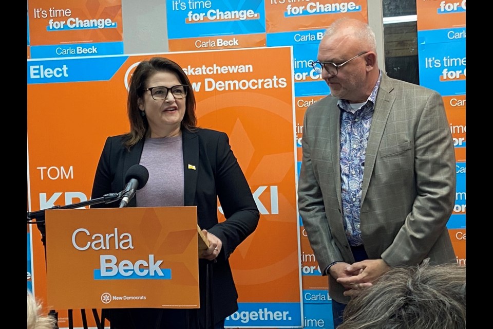 Saskatchewan NDP leader Carla Beck, left, with the Battlefords NDP candidate Tom Kroczynski, at Saturday's rally.