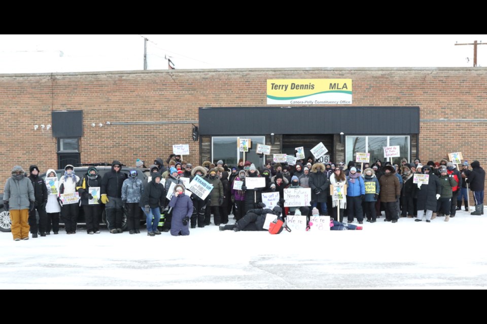 Braving the bone-chilling January cold, over 100 demonstrators from Canora and around the Good Spirit School Division gathered to picket the office of Canora-Pelly MLA Terry Dennis on Jan. 16 to press their demands for issues in the publicly funded education system.