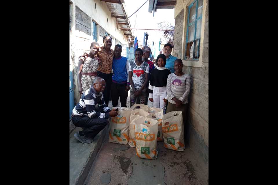 Here are the students sponsored by "Give Me Water Lord." This photo was taken as each student received their annual Christmas package.  Since these students are from very poor families, GMWL gives them a large bag of groceries to take home so their families have food. Pictured with the students were Vic Hamer, Pastor Charles Maina, who oversees the Feeding Program, and GMWL Field Representative Jane Ntaoti.