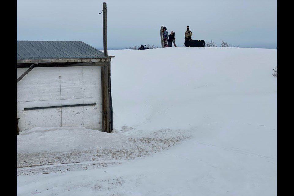 The Fleury farm outside of Lampman has snowbanks as high as 15 feet. One positive is that they have built some tobogganing hills. 