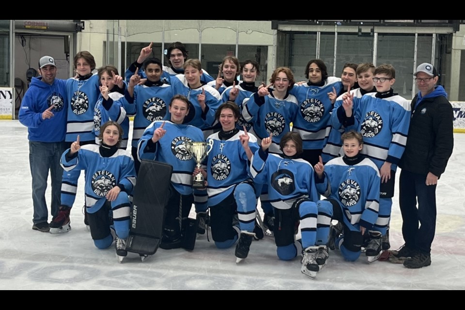 The Estevan Bears celebrate after winning their home tournament on Sunday. 