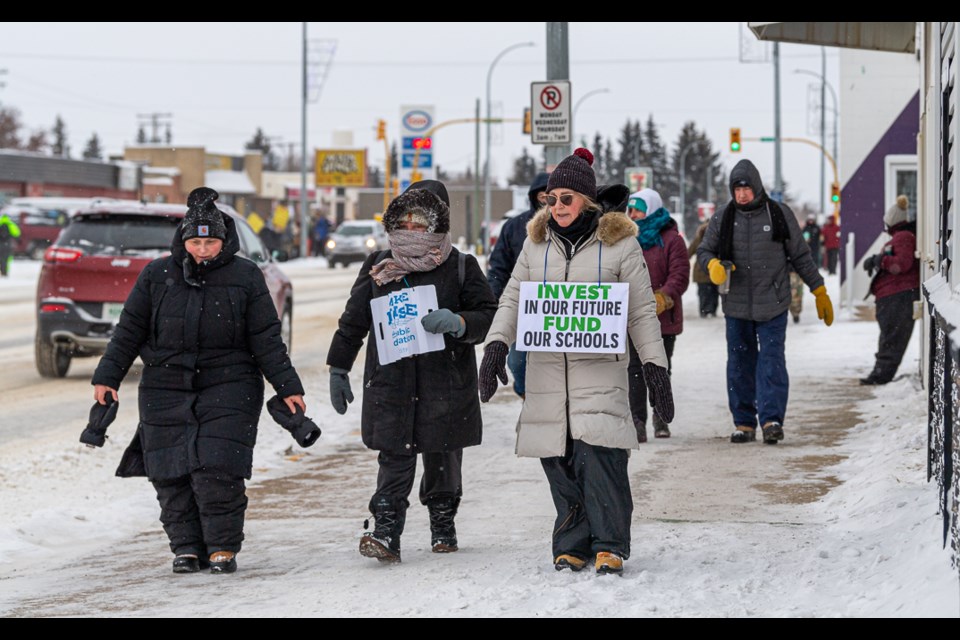 On Monday, Jan. 22, teachers walked for a second one-day strike along 100th Street in North Battleford. By noon, 400 teachers had braved the cold and snow flurries in North Battleford to walk the picket line. Many of the cars driving by honked in support of the teachers. Teachers would like to see more supports and more manageable classroom sizes in order to serve students better.