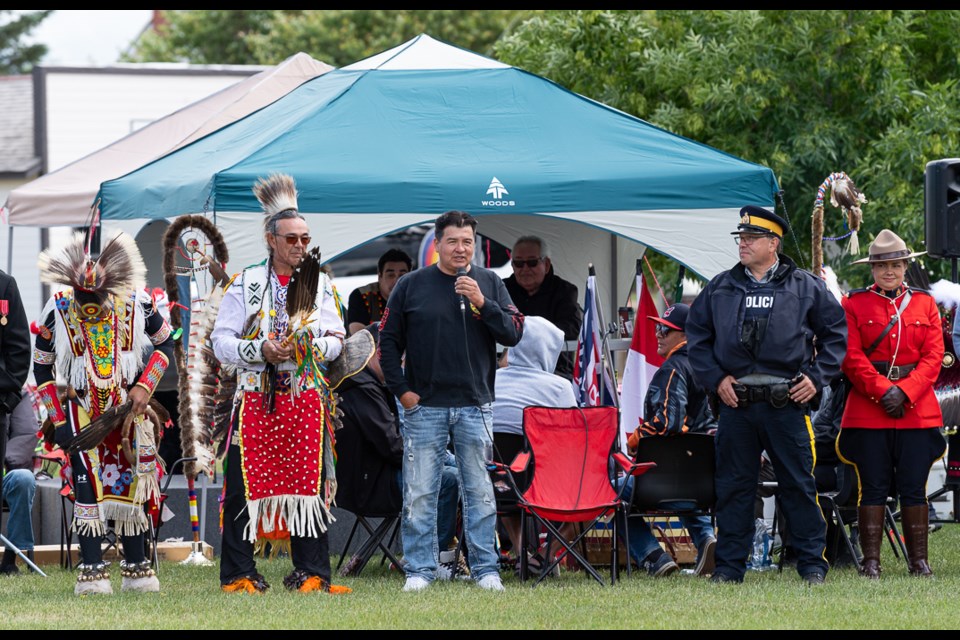 Chief Bobby Cameron gives a speech at the start of the powwow.