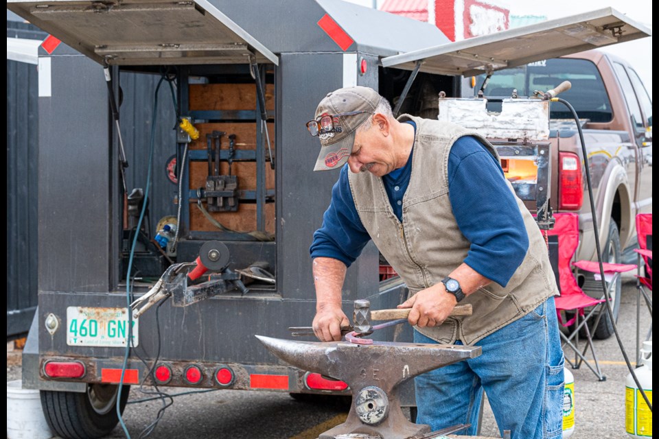 A blacksmith at work at Farm Strong Family Fun Fest, a fun event to enjoy before or after shopping Saturday at the Frontier Centre mall. All photos by Averil Hall. 
* Please note these photos carry the photographer's copyright and may not be reproduced from this gallery. For print requests, visit https://www.mphocus.com/