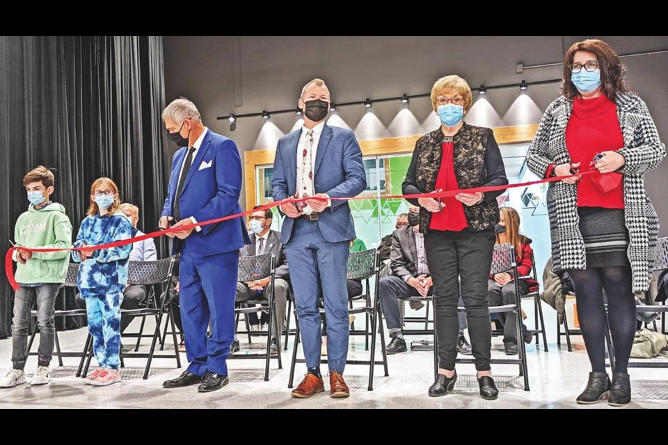 The official grand opening of Legacy Park Elementary School was one of the highlights of the year for MLA and Education Minister Dustin Duncan (centre), shown here at the ribbon-cutting in October