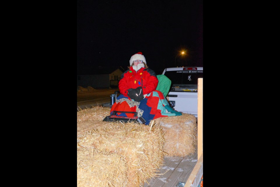 Mrs. Clause made a special trip to Wilkie to accompany those who went on the truck and trailer tours of the Christmas lights in Wilkie Dec. 14.