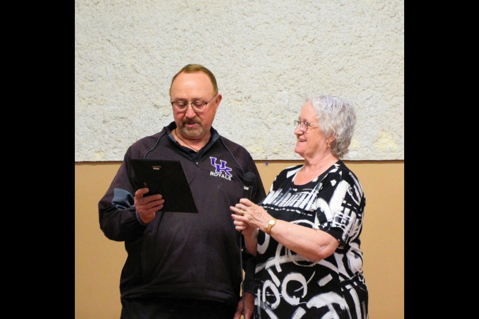 Unity Western Days committee member, Mary Anne Gaetz, after reading the nomination, presents Don Robertson with the 2022 Citizen of the Year.