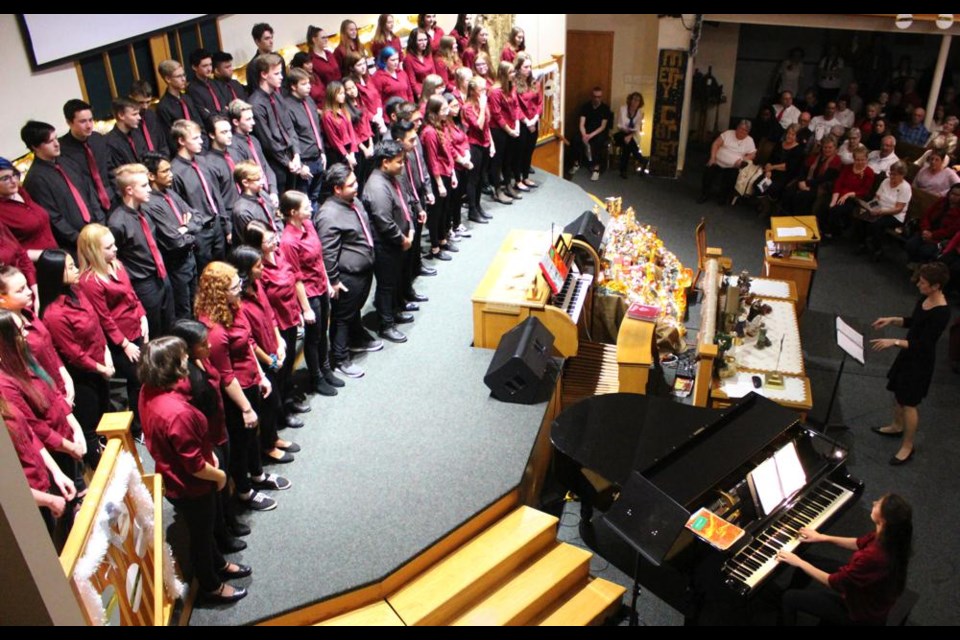 This was the WCS senior choir in 2019, led by teacher Holly Butz at right - and they will be back on Sunday evening for this year's festival.