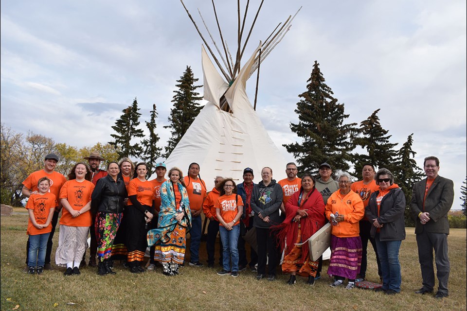 Dignitaries, leaders, and community members gathered at The Ridge for a pipe ceremony.