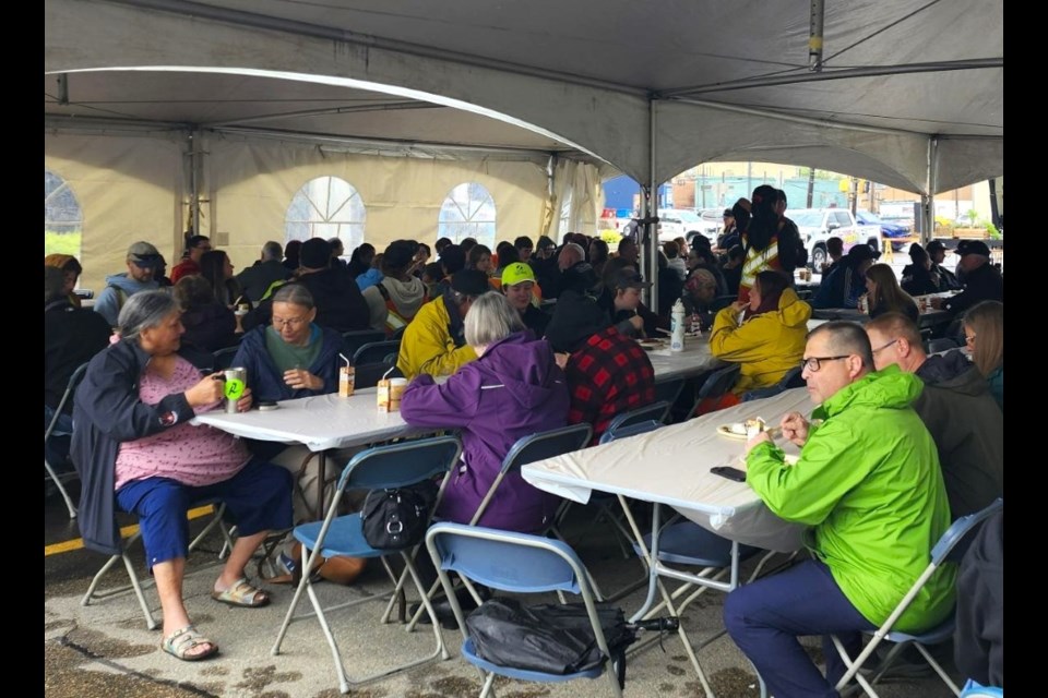 People enjoy their breakfast while listening to and watching live entertainment. 