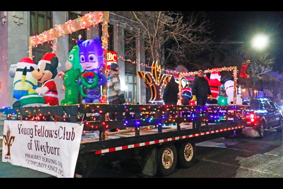Groups like the Young Fellows Club, shown here last year, will have entries in the Parade of Lights on Thursday, Dec. 2.