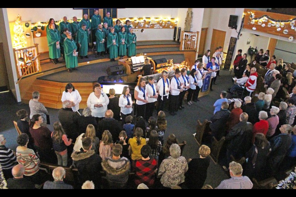 Members of the Quota Club of Weyburn gathered to sing "Silent Night" at the conclusion of the Carol Festival two years ago, the last time the event was held in person.