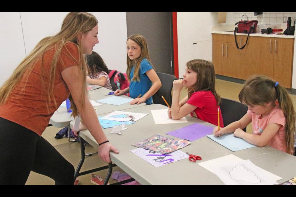 Sloane, Payton and Lenyn chatted with co-instructor Whitney Lanz-McIntyre about some of their favourite springtime activities, during the Easter break day camp.