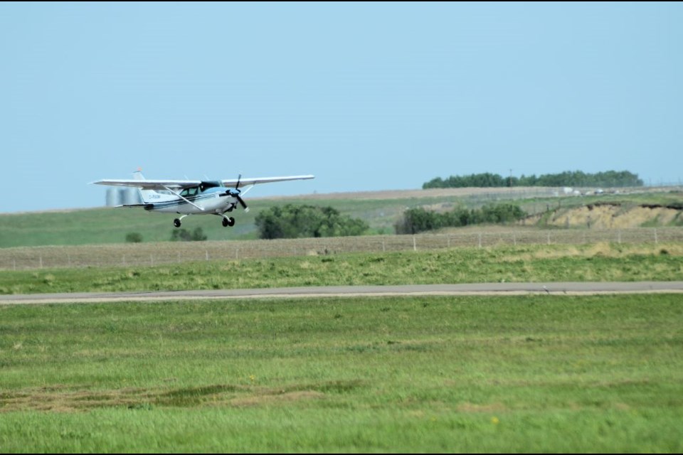 Bill Garnett of Saskatoon takes off in his 182 RGII after a visit to the Unity Flying Club's fly-in June 5.
