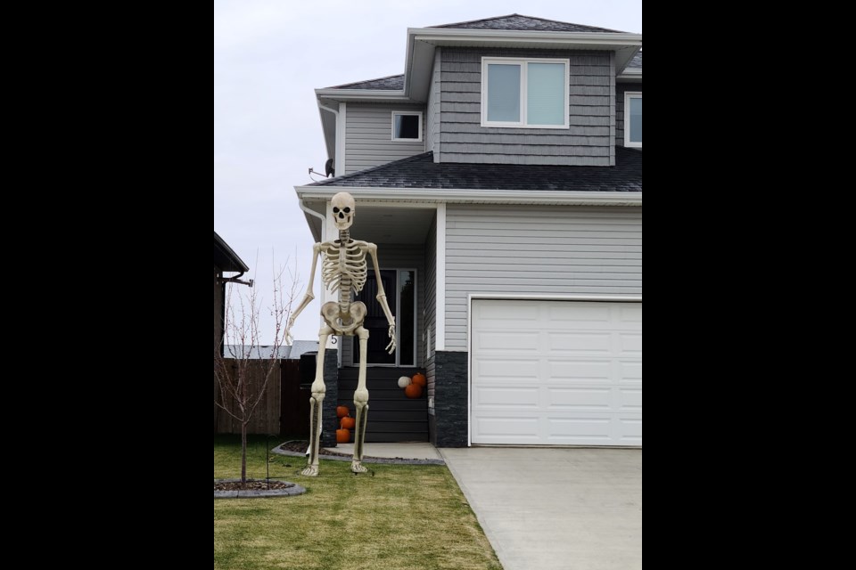 Skele-tall, this 10 foot creature is ready to greet trick or treaters.