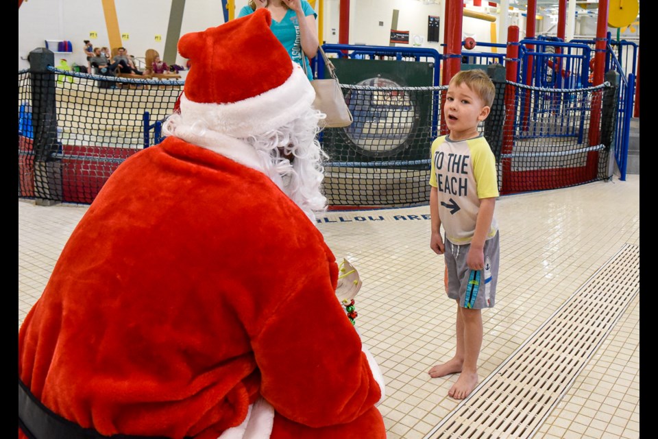 Santa listened to every child's wish for Christmas. This little boy had a big list.