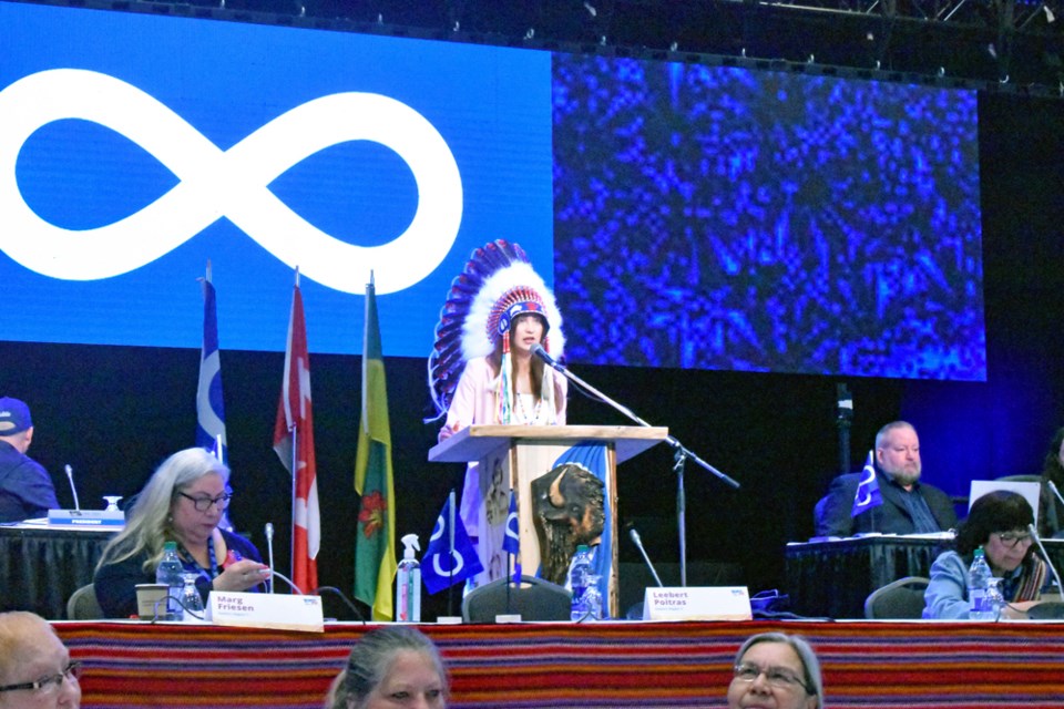 Federation of Sovereign Indigenous NationsThird Vice-Chief Aly Bear, center speaks to members of the Métis Nation-Saskatchewan members during Saturday's opening of the MNS spring legislative assembly at World Trade Hall C at the Prairieland Park.