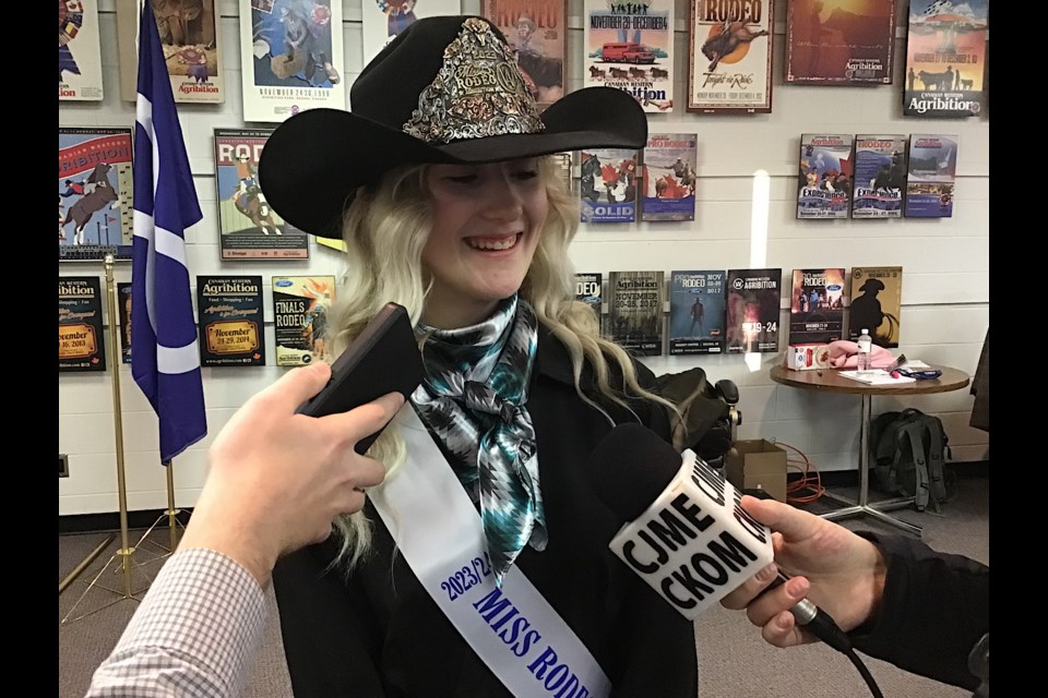 Ari Dyck speaks to reporters as new Miss Rodeo Agribition