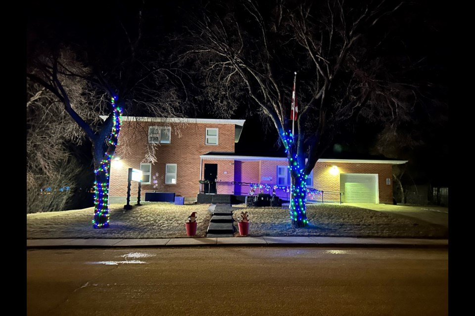 The night time view of Assiniboia's RCMP Detachment shows the collaborative effort of members and residents who helped 'Decorate the Detachment' on Dec. 10, part of the Assiniboia RCMP community engagement efforts.