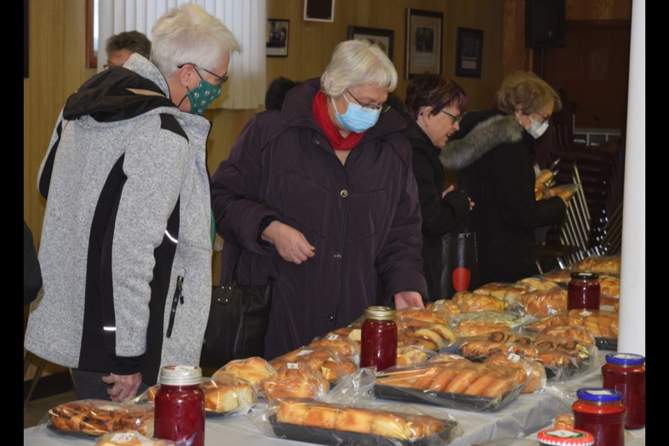 Shoppers at the Canora UCWL Christmas bakes sale held at the Ukrainian Catholic Hall on Dec. 8 had a wide assortment of tasty treats to choose from for their holiday season needs, including: borsch, kolachi, doughnuts, cinnamon buns, cabbage rolls, baked perogies and regular perogies, as well as goodie trays filled with a variety of mouth-watering sweets.