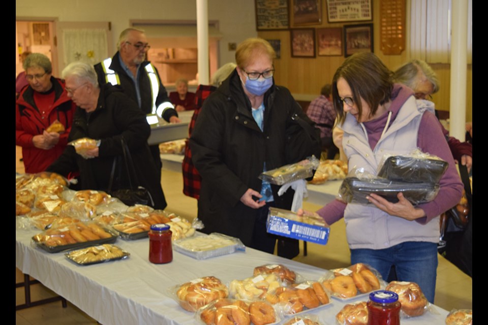 There was something for pretty much everyone at the Canora UCWL Christmas bake sale, which took place at the Ukrainian Catholic Hall on Dec. 7 as part of the Canora Winter Lights Festival. Fresh, homemade food items available included: perogies with a variety of fillings, three kinds of cabbage rolls, borscht, kolachi, doughnuts, buns, cakes, cookies and other sweets.