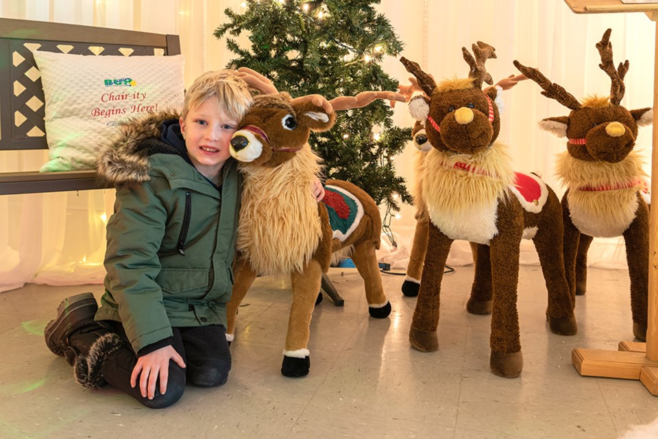 While viewing the Festival of Trees decorations at Frontier Mall, Madden Kemp said he liked the little reindeers the best. 
