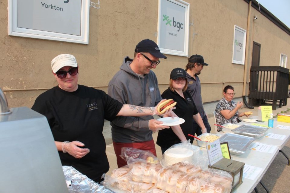 Mayor Aaron Kienle volunteering his time alongside the Bentley staff.