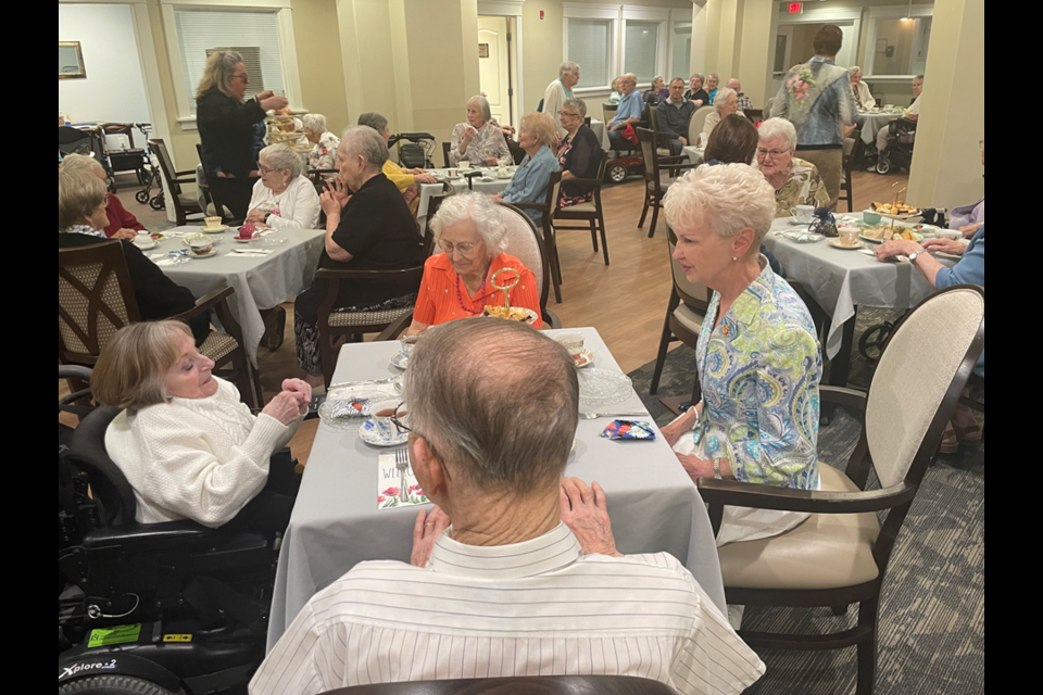 Saskatchewan Lt. Gov. Bernadette McIntyre sits down for tea with residents at Renaissance Retirement Living.