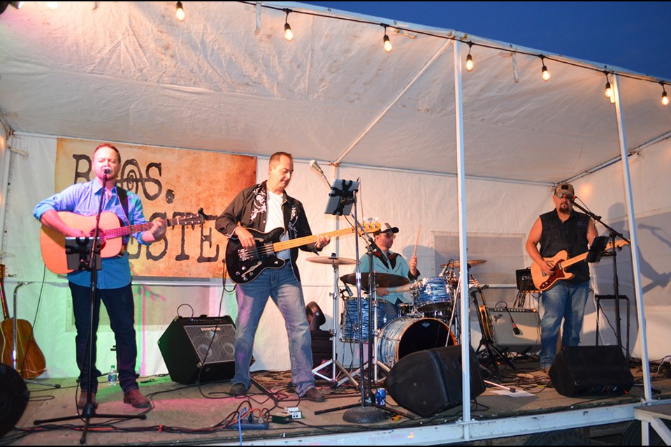 Bros. Chester bandmates Mark Krull (rhythm guitar), Ed Fahlman (bass guitar), Aaron Pritchard (drums) and Kevin Shultz (guitar) performed at Kenosee Lake on the beach on July 29.