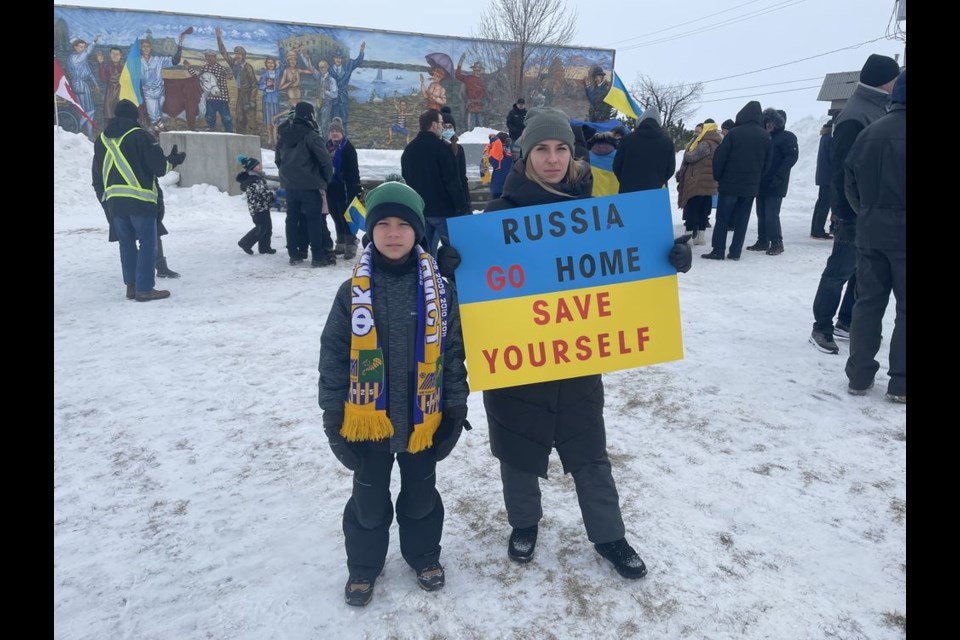 At a rally in support of Ukraine held at City Centre Park in Yorkton on Sunday, among the participants were Vadym and Iryna Zaika and their nine-year-old son Roman of Canora. The young family came to Canada from the Ukraine in July 2021, in large part to get away from the danger of repeated invasion threats by Vladimir Putin and Russia. 