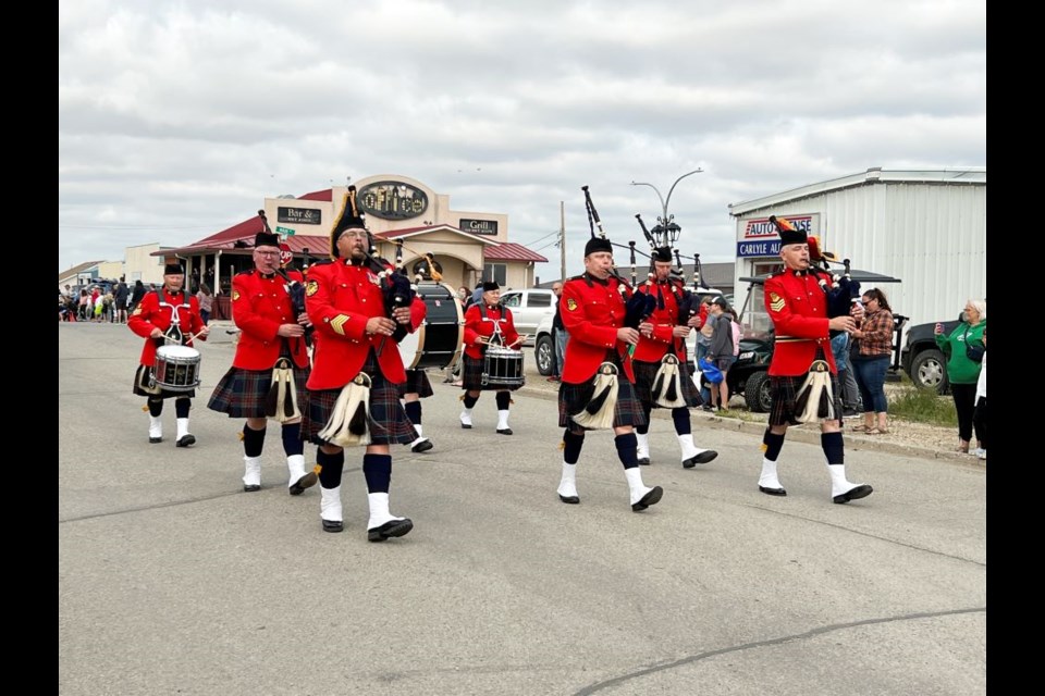 Escorted by the Carlyle RCMP, the familiar sound of the bagpipes soon followed. 