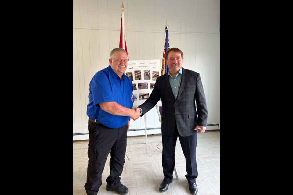 Jeff Young, president of Royal Canadian Legion Carnduff Branch #216, thanking local MLA Daryl Harrison for the government’s grant of $25,000 earlier this year. The Legion was very appreciative of the grant, as it enabled them to take care of some long overdue renovations to the building, including the replacement of windows flooring and carpeting, and the painting of walls and cupboards. 