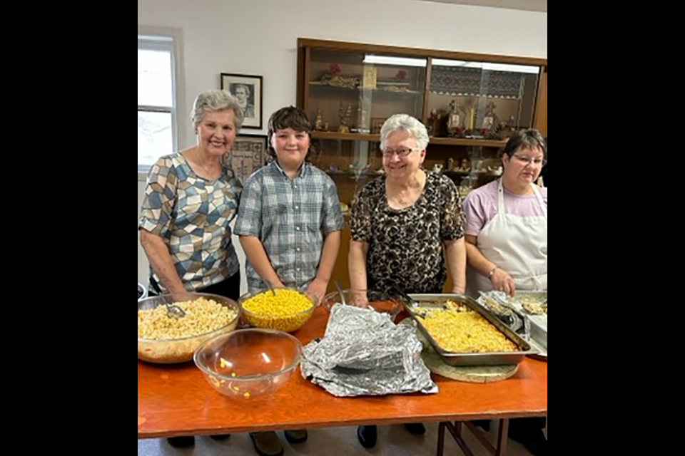 Some of the servers at the fundraiser for the Mazeppa cemetery, from left, were: Violet Ostifie, Ty Korol, Joanne Zawislak, and Lorie Wasyliw.