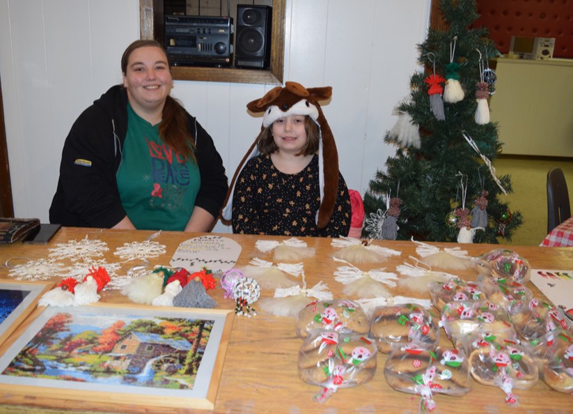 Kaitlyn Kollman and daughter Natalie of Canora, known as Kat and Nat Creations, provided many Christmas-related treats, including cookies, diamond paintings and other decorations, at the Canora Rainbow Hall Christmas Market on Nov. 26.

