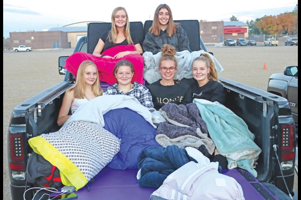 A group of friends snuggled under blankets to watch the "cinema under the stars" a year ago, with the event back again on Sept. 24 with a double-feature.