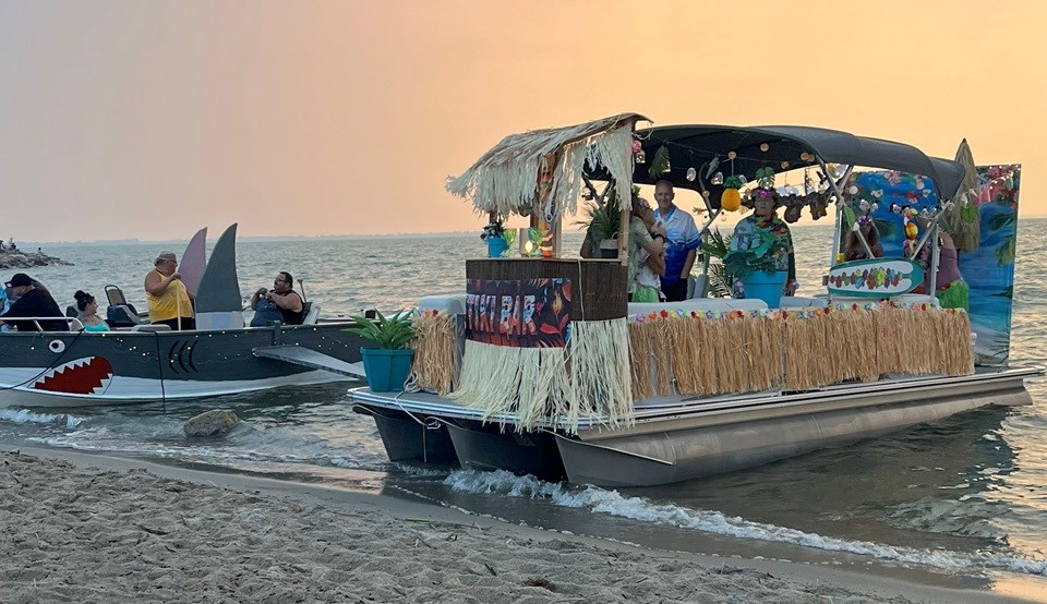 Shown is a photo of one of the boats decorated for Cochin Days.