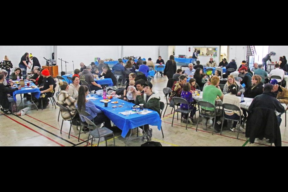 The tables were full for most of the community potluck event held at Weyburn's Knox Hall on Saturday.